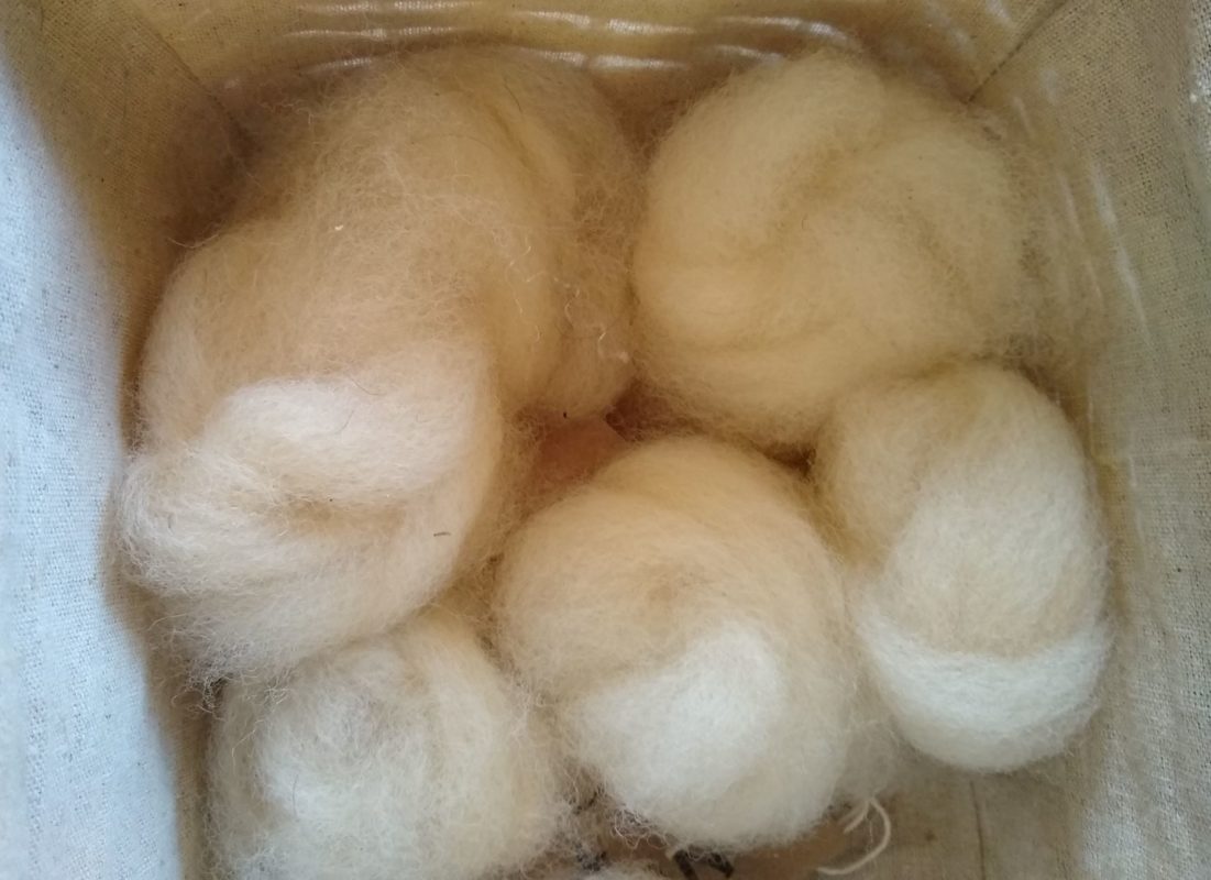 Combed nests of fibre for spinning