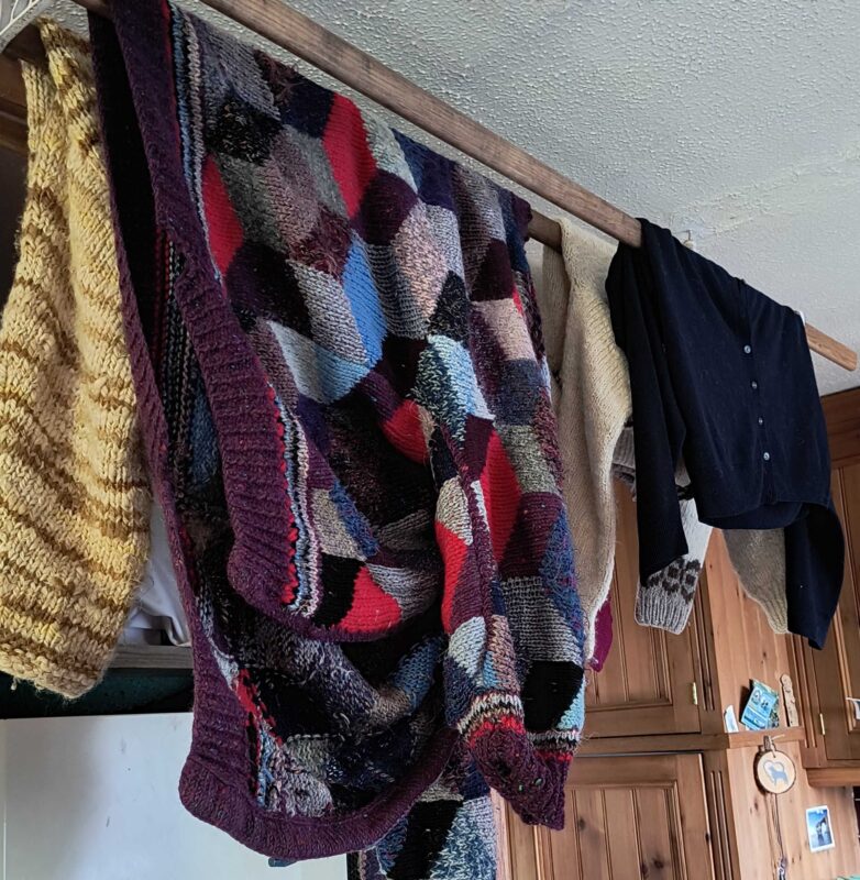 woollen clothes drying on a line